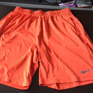 Orange Nike shorts
